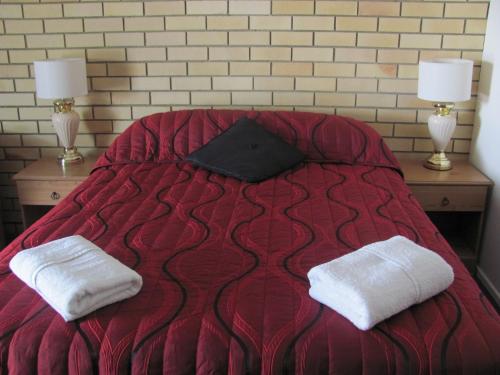 Postel nebo postele na pokoji v ubytování Nambour Central Motel