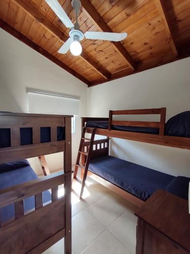 Postel nebo postele na pokoji v ubytování Cabañas Doña Itati