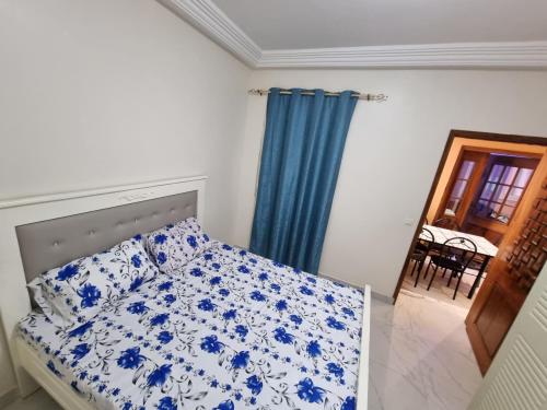 Кровать или кровати в номере SUPERBE APPARTEMENT MEUBLÉ AU BORD DE LA PLAGE