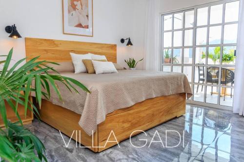 Un ou plusieurs lits dans un hébergement de l'établissement VILLA GADI - Roof Garden - Pizza Oven - Tiny Pool