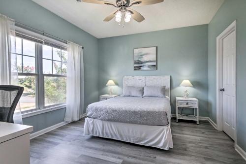 a bedroom with a bed and a ceiling fan at Gorgeous Lewes Getaway about 3 Mi to the Beach! in Lewes