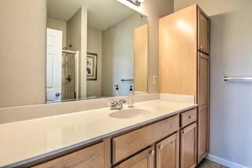 a bathroom with a sink and a mirror at Gorgeous Lewes Getaway about 3 Mi to the Beach! in Lewes