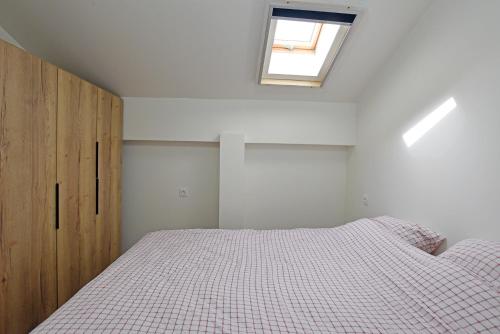 Ein Bett oder Betten in einem Zimmer der Unterkunft Le Mas Soli - Gîtes et Réception