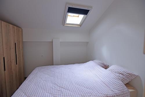 Ein Bett oder Betten in einem Zimmer der Unterkunft Le Mas Soli - Gîtes et Réception