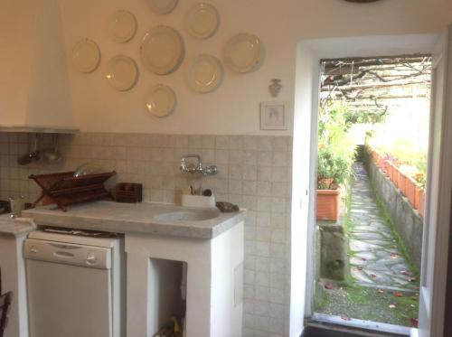 Impero Luxury Apartment tesisinde mutfak veya mini mutfak