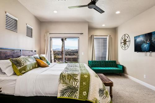 a bedroom with a bed and a green couch at Zion Village Elements Earth in Hurricane