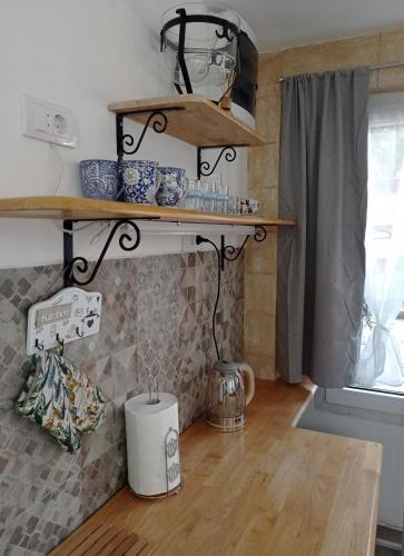 Kuchyň nebo kuchyňský kout v ubytování Meda Apartment