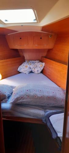 a bed in the back of a boat at Bed & Boat Holiday in La Spezia