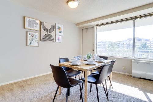 a dining room with a table and chairs and a window at Great 1 Bedroom Condo At Arlington With Gym in Arlington