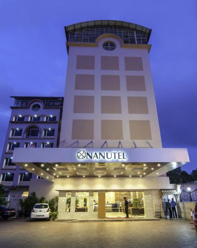 a tall building with a sign on the front of it at Nanutel Margao in Madgaon