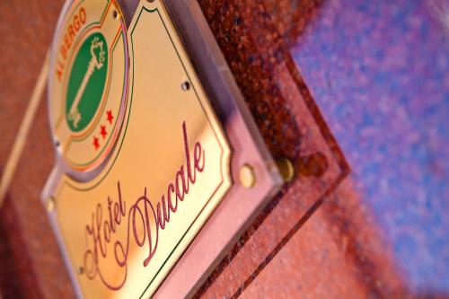 a close up of a sign on a toy car at Hotel Ducale in Favaro Veneto