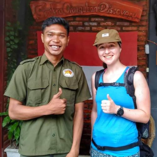 a man and a woman giving the thumbs up at Sumatra Orangutan Discovery Villa in Bukit Lawang