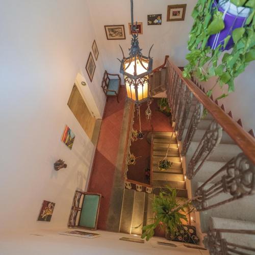 an overhead view of a staircase in a house at Casaldo's rooms in Florence