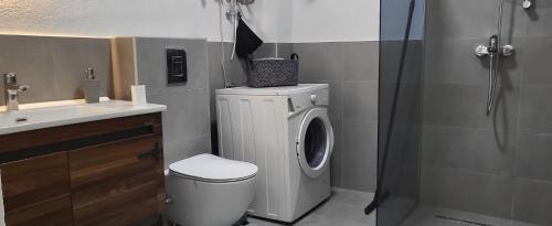 Ein Badezimmer in der Unterkunft Apartman Bajka
