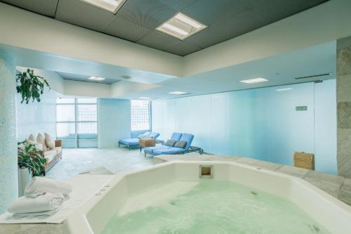 a large bath tub in a large room at Camino Real Santa Fe in Mexico City