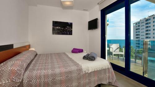 Posteľ alebo postele v izbe v ubytovaní Apartamento Sea Senses