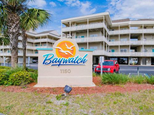 a hotel sign in front of a building at Baywatch #C5 in Pensacola Beach