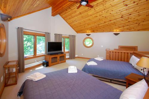 Ένα ή περισσότερα κρεβάτια σε δωμάτιο στο After Dune Delight