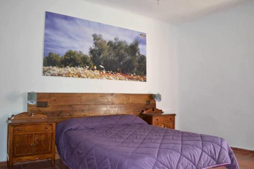 Postel nebo postele na pokoji v ubytování Finca el Vizconde - Naturaleza con tus hijos