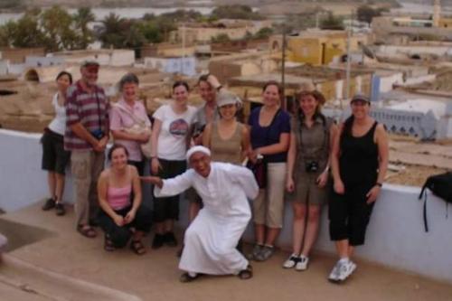 a group of people posing for a picture at Go Inn Backpackers in Aswan