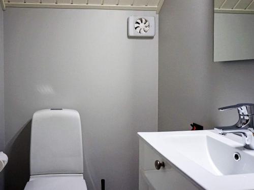 a bathroom with a toilet and a sink at 8 person holiday home in Grebbestad-By Traum in Grebbestad