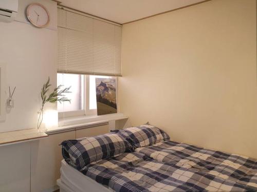 Postel nebo postele na pokoji v ubytování [ COM,A stay] Hongdea St 5min / 3room