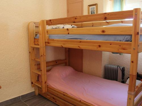 Poschodová posteľ alebo postele v izbe v ubytovaní Appartement Port-la-Nouvelle, 3 pièces, 4 personnes - FR-1-229C-77