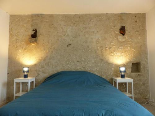 Ένα ή περισσότερα κρεβάτια σε δωμάτιο στο Gîte Charroux - Allier, 4 pièces, 6 personnes - FR-1-489-394