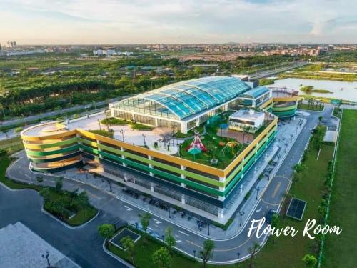 an aerial view of a building in a city at Apartment 1BR-FL27th-R103 Building-Vinhome Ocean Park in Hanoi