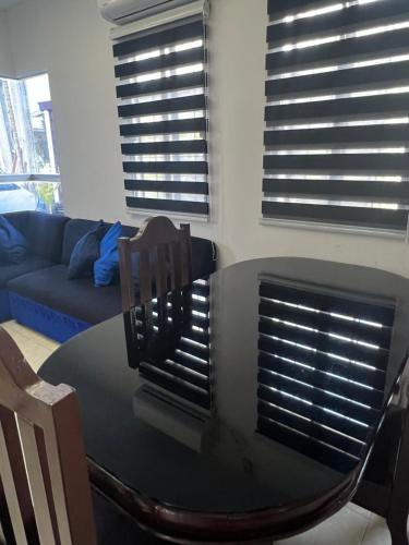Davao Transient Villa with 24hrs security guard BBQ Grill , Free Parking and Wifiにあるシーティングエリア