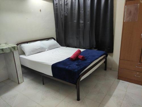 Postel nebo postele na pokoji v ubytování CiTY Homestay Budget 2bedrooms Midtown Kuala Terengganu