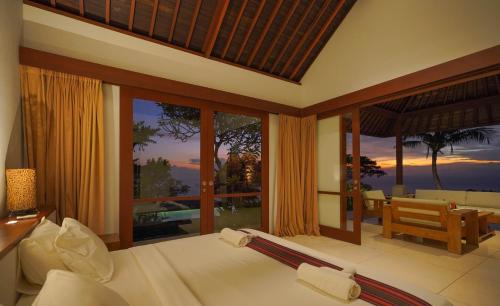 Postel nebo postele na pokoji v ubytování Villa Vanna - Lombok