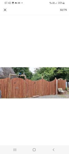 a picture of a fence in a yard at The parrot hotel, live in a rescue animal park in Næstved