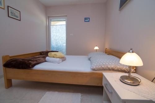 Katil atau katil-katil dalam bilik di Apartment Punta kriza 8082b