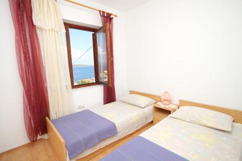 Posteľ alebo postele v izbe v ubytovaní Apartment Sali 8152b