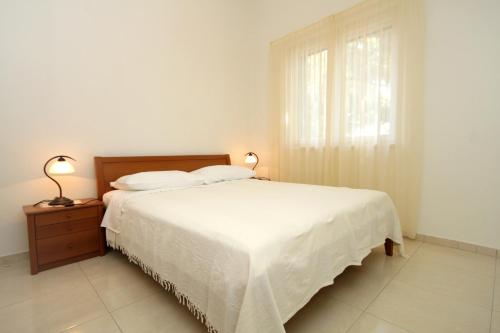 Katil atau katil-katil dalam bilik di Apartment Verunic 8103a