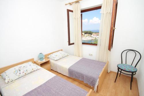 Posteľ alebo postele v izbe v ubytovaní Apartment Sali 8152a