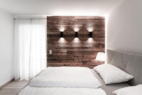 Postel nebo postele na pokoji v ubytování Planai Penthouse Royal