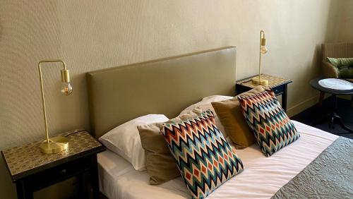 Un pat sau paturi într-o cameră la Logies Graaf Van Vlaanderen