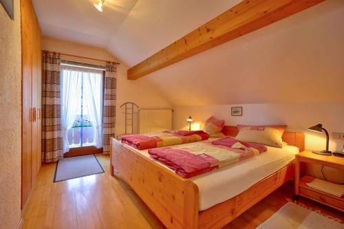 Un pat sau paturi într-o cameră la Beim Rieder