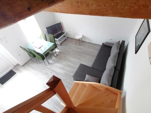 an overhead view of a living room with a couch and a table at Kuća za odmor Tena in Tribalj