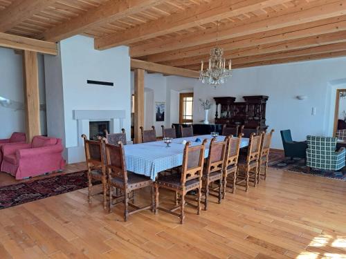 a dining room with a table and chairs at Tarcal Apartman in Tarcal