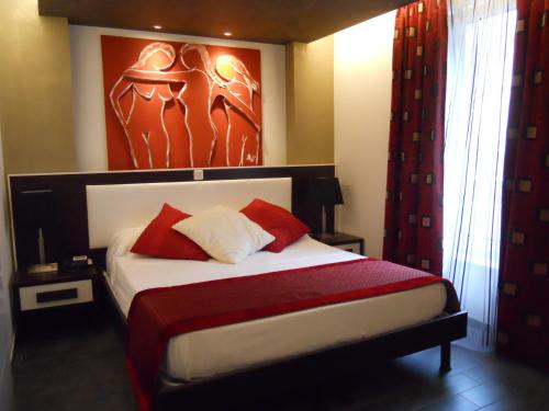 Łóżko lub łóżka w pokoju w obiekcie AppartHotel Belle Vue