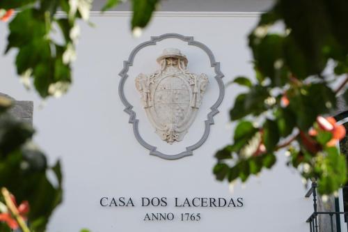 a sign for the casa dos laderasugi hugs at Casa dos Lacerdas in Mourão