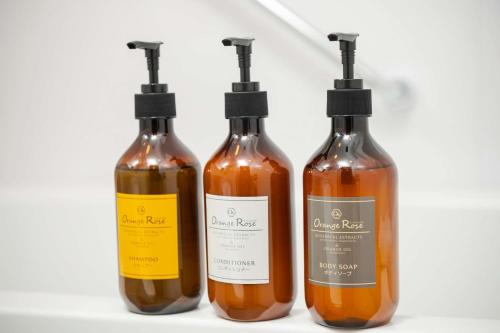 a group of four bottles of sauce at Best Western Hotel Fino Tokyo Akasaka in Tokyo