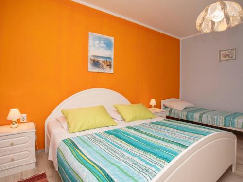 Postel nebo postele na pokoji v ubytování Apartment Olivia by Interhome