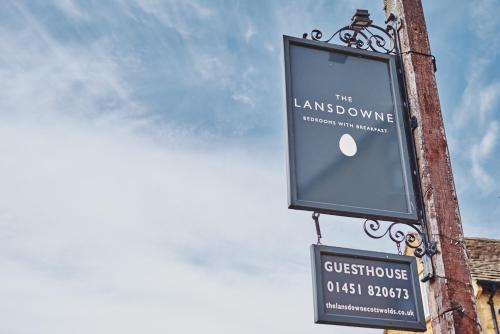 a sign for the lanscape on a pole at The Lansdowne Boutique Rooms with Breakfast - Adults Only in Bourton on the Water