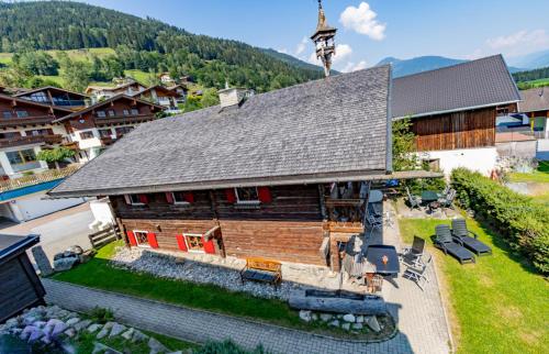an overhead view of a building with a clock tower at Das Schmiedhaus in Kaprun