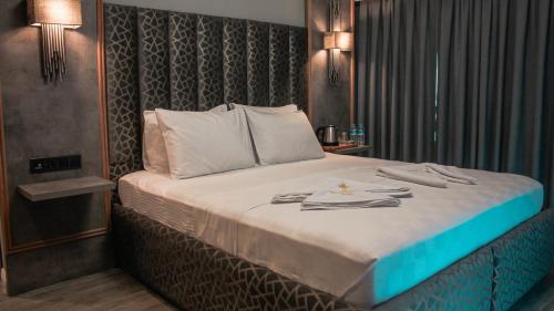 Katil atau katil-katil dalam bilik di TALLES CITY HOTEL