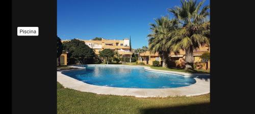 Bazén v ubytovaní PARQUE VERA Naturista FKK PLAYA, free Wifi alebo v jeho blízkosti